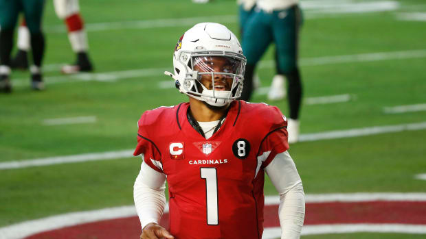 Cardinals' Kyler Murray (1) celebrates scoring a rushing touchdown against the Eagles during the first half at State Farm Stadium in Glendale, Ariz. on Dec. 20, 2020.